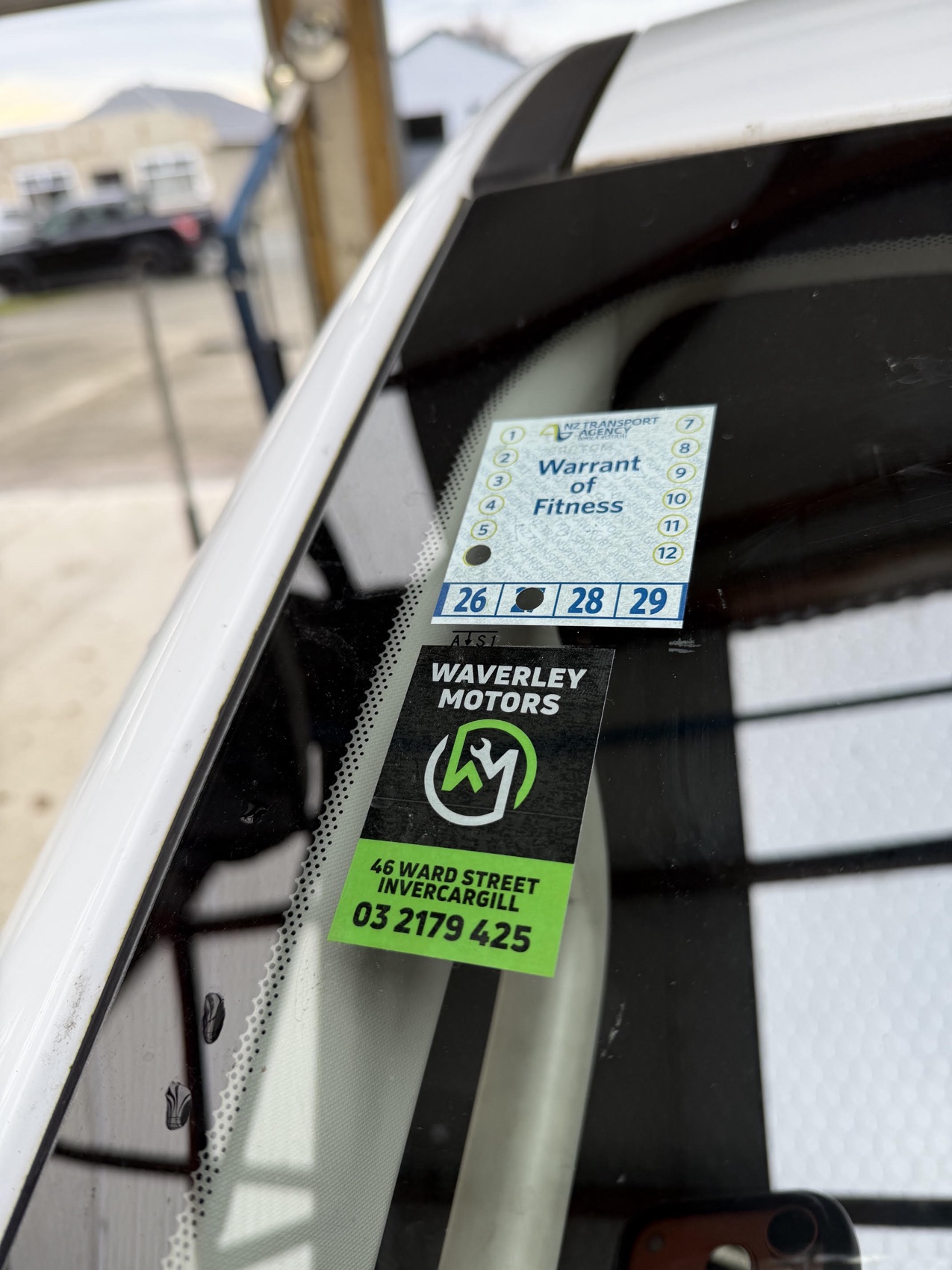 Warrant of Fitness sticker on a windscreen at Waverley Motors