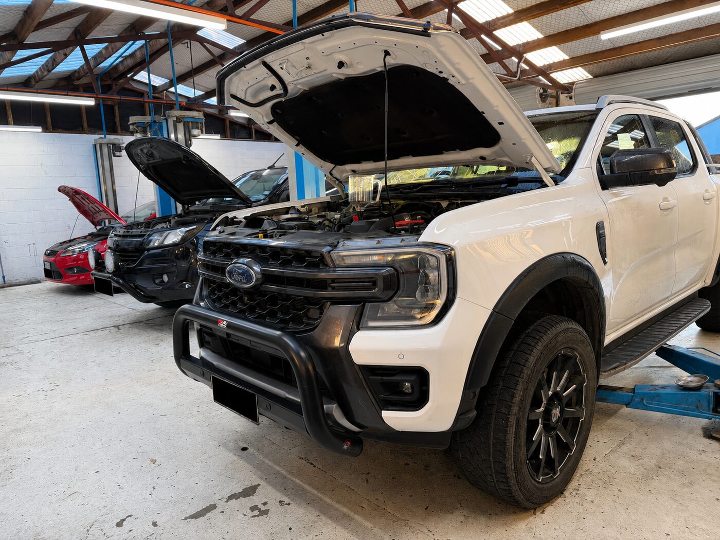 Ford Ranger with the bonnet up being serviced at Waverley Motors